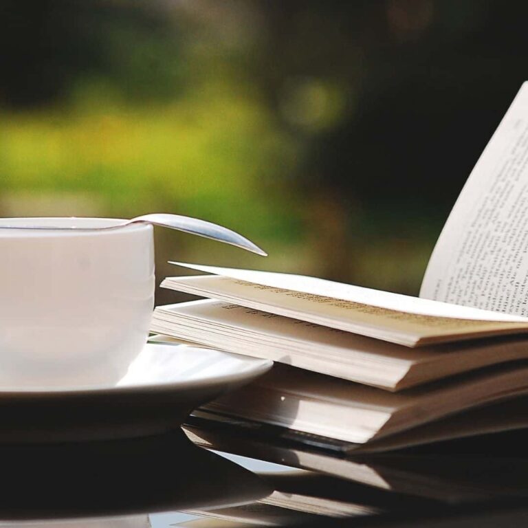 cup of coffee and an open book