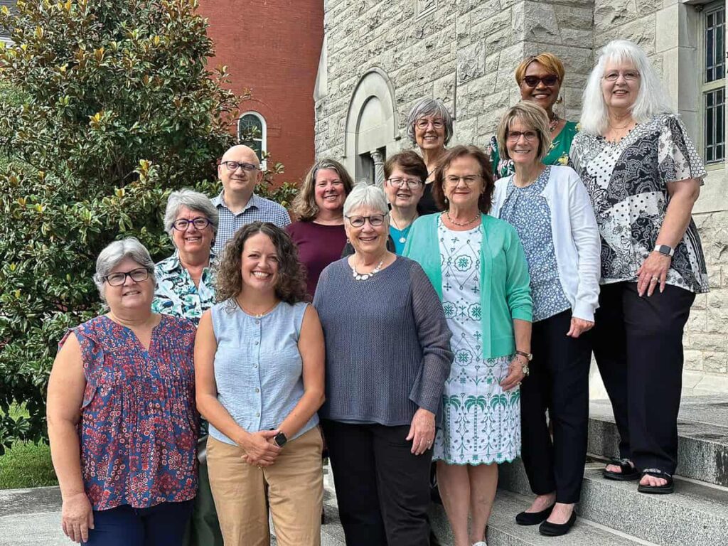 2025 Souljourners graduates, front row, L-R: Mary Andrews, Melea White, Diane O’Brien, Jennifer Jones, Dana Preusch, Paula Jean Adair; back row, L-R: Margaret Harris, Mark Lepper, Heather Coates, Jennifer Halling, OSB, Susan Wade, and Glenda Johnson.