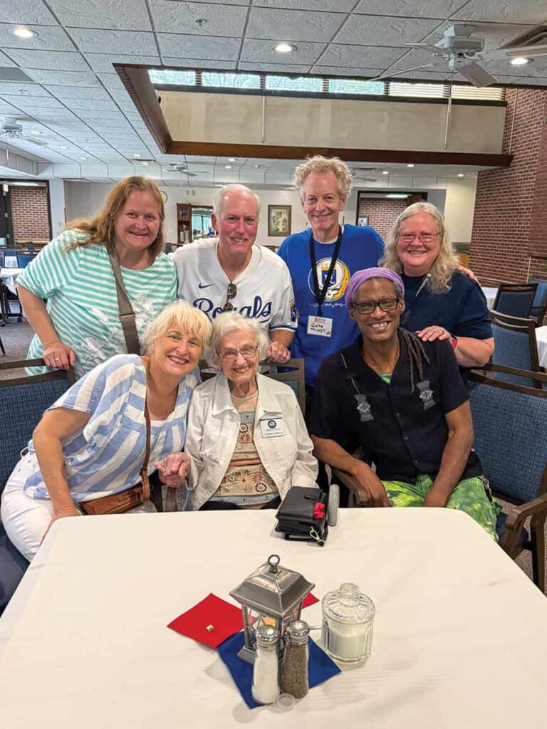 Alumni visit with Sister Deborah Peters at an ice cream social hosted by the Mount.